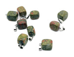 Tumbled gemstone pendant featuring a crystal love stone, handcrafted by GemstoneGO, with a natural polished finish and unique shape.