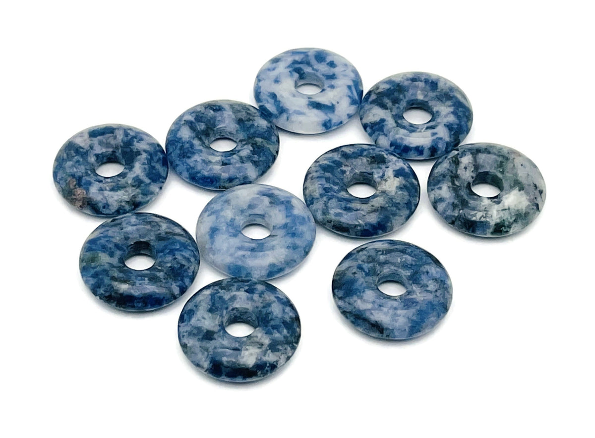 Blue Spot Jasper crystal donut from GemstoneGO, 20mm Pi Stone with vibrant blue spots and polished surface.