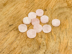 Round rose quartz flat gemstone slab from GemstoneGO, showcasing a smooth, polished pink crystal surface for jewelry or decor.