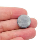 Round Labradorite flat gemstone slab from GemstoneGO showing iridescent blue and green flash on polished stone surface.