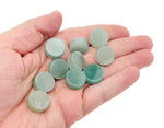 Round aventurine flat gemstone slab from GemstoneGO, showcasing smooth green crystal with natural stone patterns.