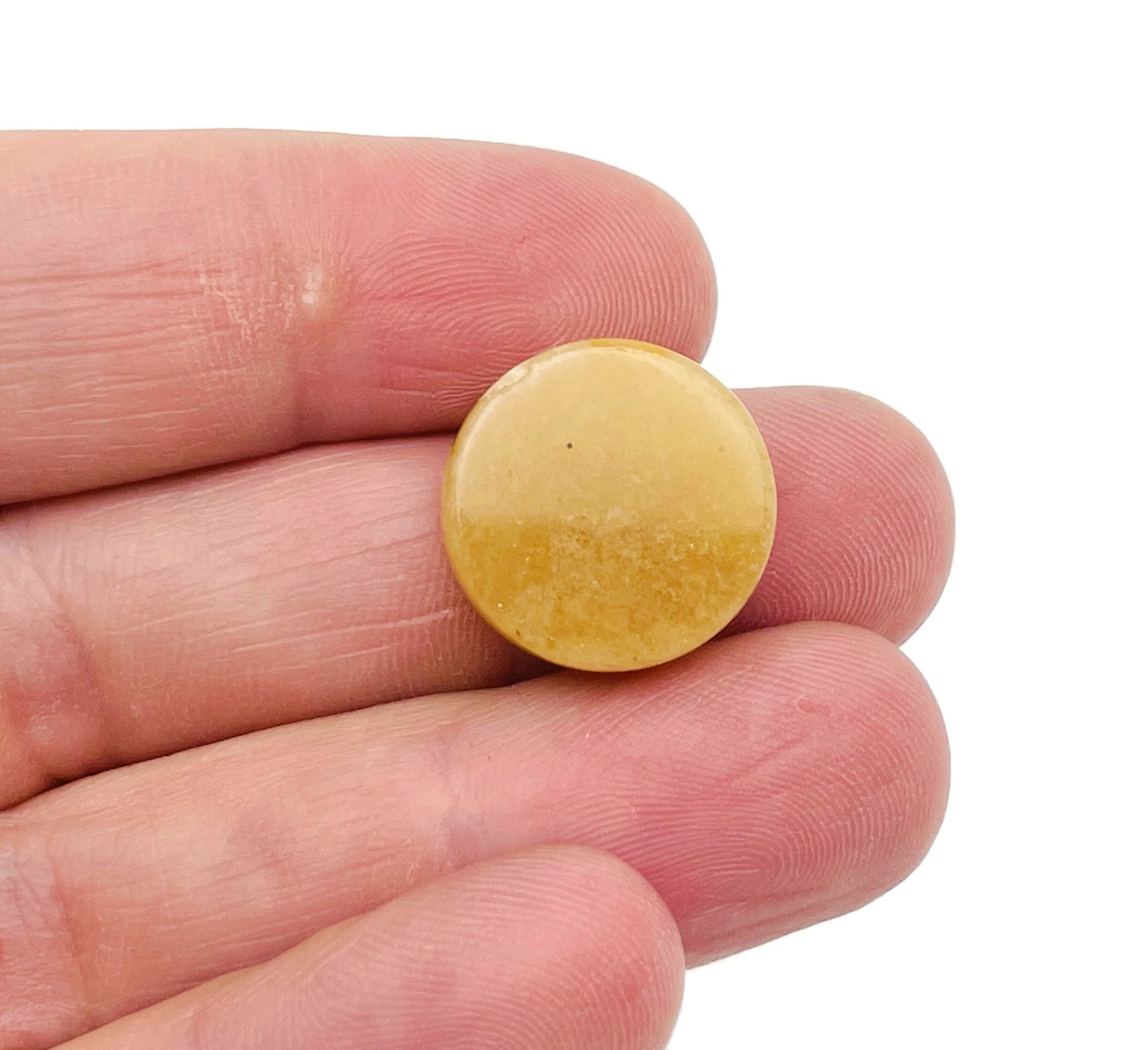 Round yellow jade flat gemstone slab from GemstoneGO, showcasing vibrant yellow color and smooth polished surface.