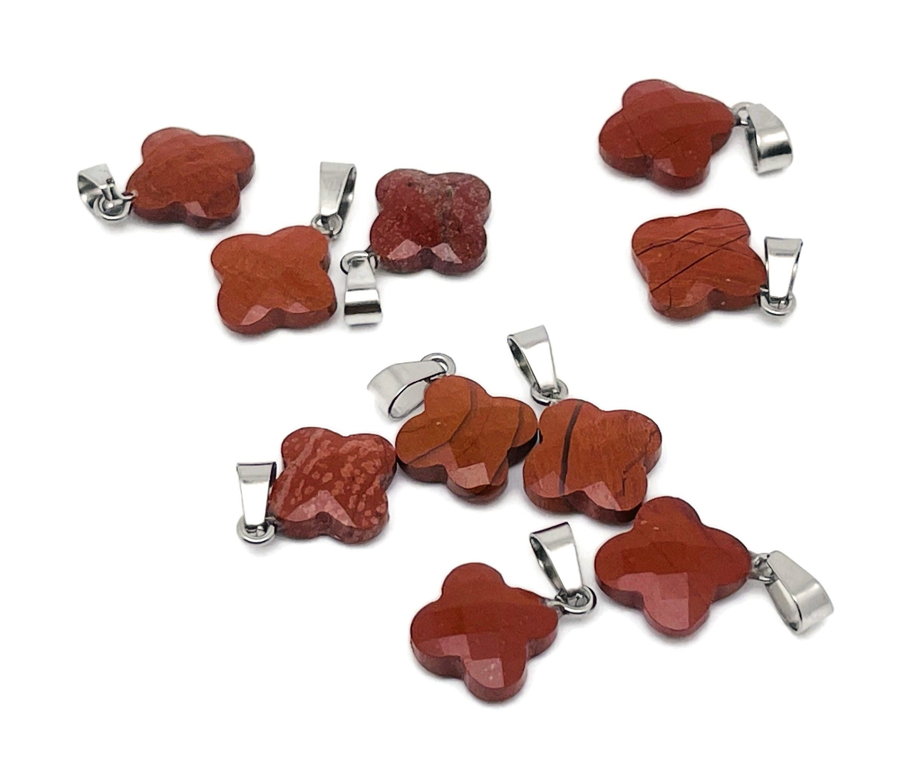 Red Jasper four-leaf clover crystal pendant for DIY jewelry making, featuring a vibrant gemstone from GemstoneGO.