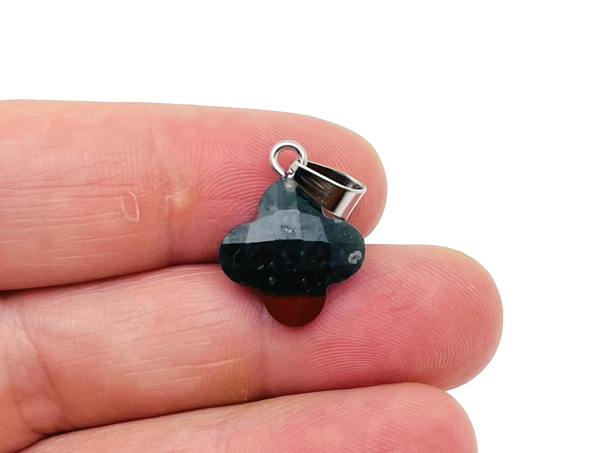 African Bloodstone four-leaf clover crystal pendant from GemstoneGO, showing a vibrant green gemstone with natural inclusions.