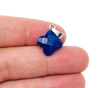 Lapis Lazuli four-leaf clover crystal pendant by GemstoneGO, detailed close-up showing vibrant blue gemstone and silver setting.