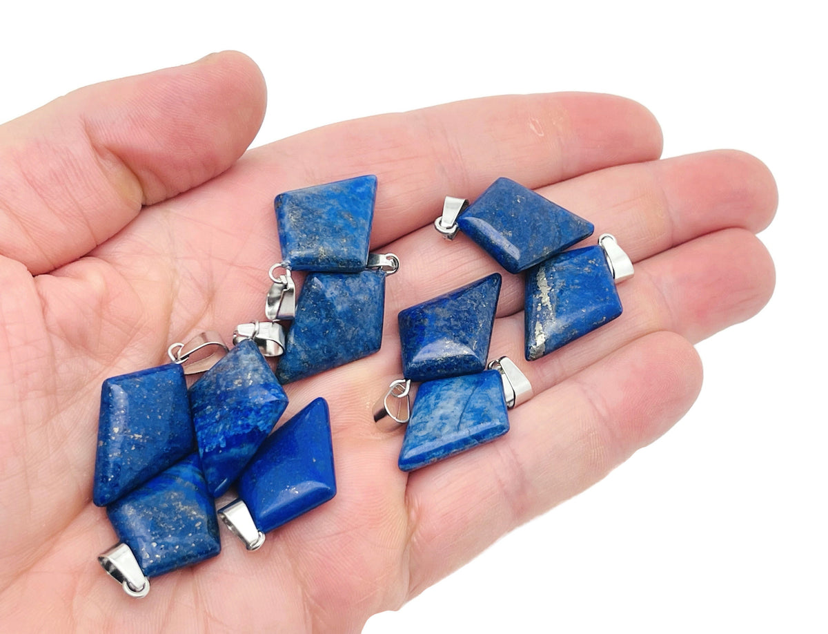 Lapis Lazuli triangle gemstone pendant with geometric design, showcasing deep blue stone with gold flecks, by GemstoneGO.