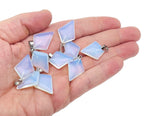Opalite triangle gemstone pendant from GemstoneGO featuring a geometric design and smooth polished surface.