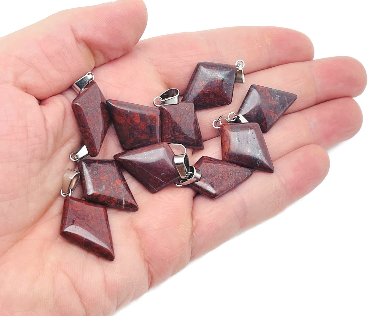 Chicken Bloodstone Jasper triangle pendant, geometric gemstone from GemstoneGO, showcasing deep red and green natural stone detail.