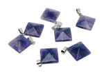 Natural amethyst pyramid gemstone pendant from GemstoneGO, showcasing a polished purple crystal pendant on a silver chain.
