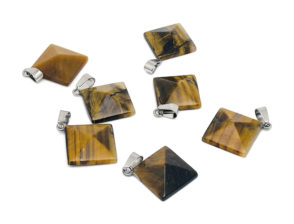 Tiger Eye pyramid gemstone pendant from GemstoneGO featuring a polished natural Tiger Eye stone on a silver setting.