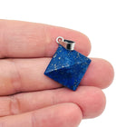 Lapis Lazuli pyramid gemstone pendant from GemstoneGO featuring a natural blue gemstone with golden pyrite inclusions.