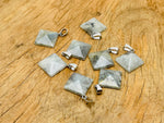 Labradorite pyramid gemstone pendant with natural gemstone jewelry design, showcasing iridescent colors and intricate craftsmanship.
