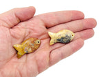 Crazy Lace Agate fish-shaped gemstone pendant with Pisces zodiac symbol and hole for necklace chain, by GemstoneGO.