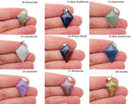 Triangle gemstone pendant with geometric design from GemstoneGO featuring a vibrant multicolored gemstone setting.