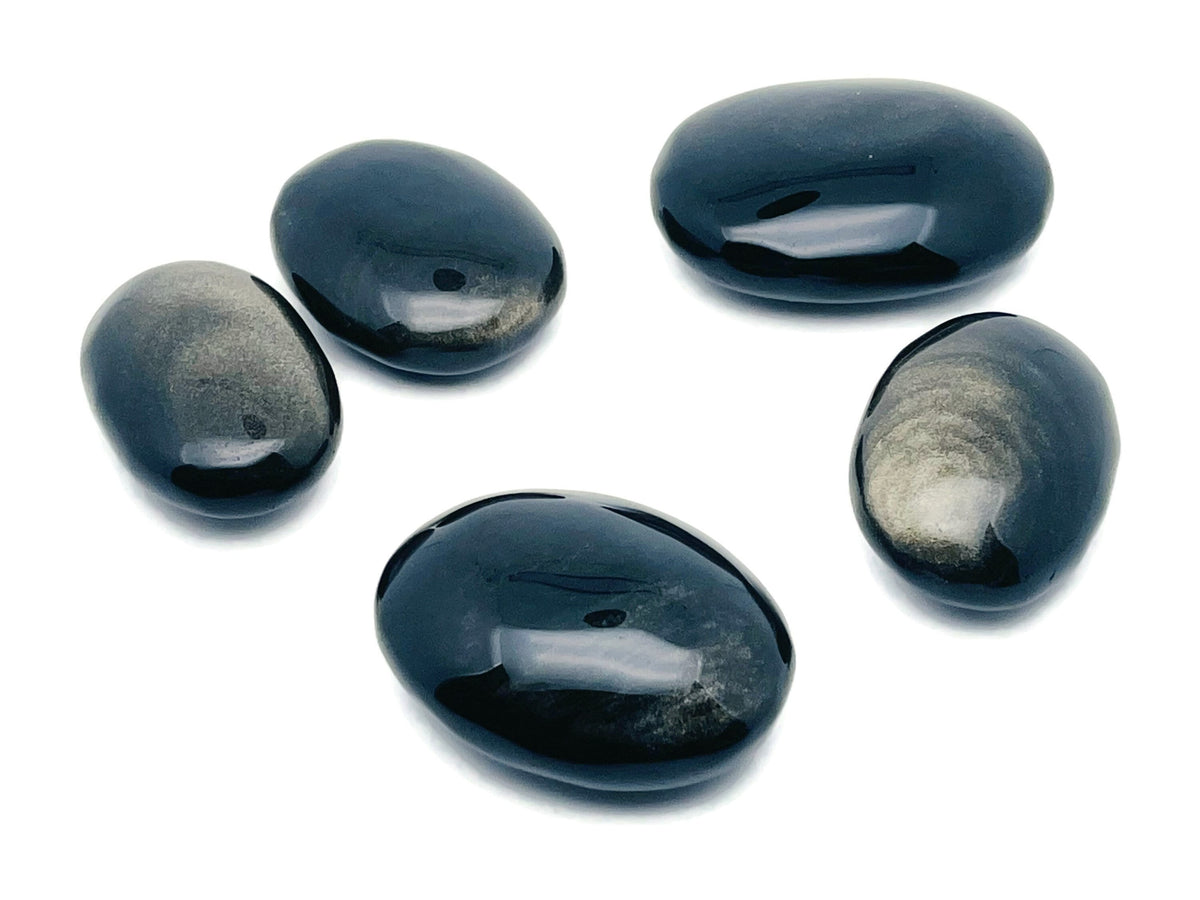Golden Sheen Obsidian palm gemstone spa stone from GemstoneGO, showcasing its smooth, polished surface and rich golden shimmer.