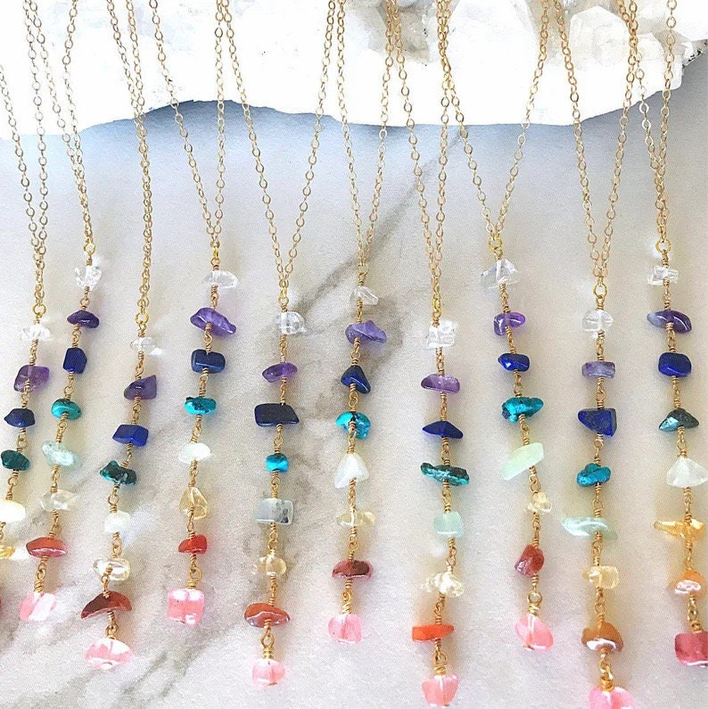 7 Chakra crystal necklace with silver and gold accents, featuring colorful gemstones representing each chakra, gemstoneGO jewelry