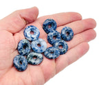 Blue Spot Jasper crystal donut from GemstoneGO, 20mm Pi Stone with vibrant blue and brown spots, polished and smooth surface.