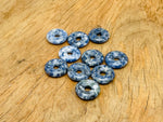 Blue Spot Jasper crystal donut pendant from GemstoneGO, 20mm Pi Stone with vibrant blue and natural stone patterns.