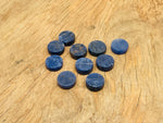Round sodalite flat gemstone slab from GemstoneGO, showcasing deep blue and white veined mineral pattern.