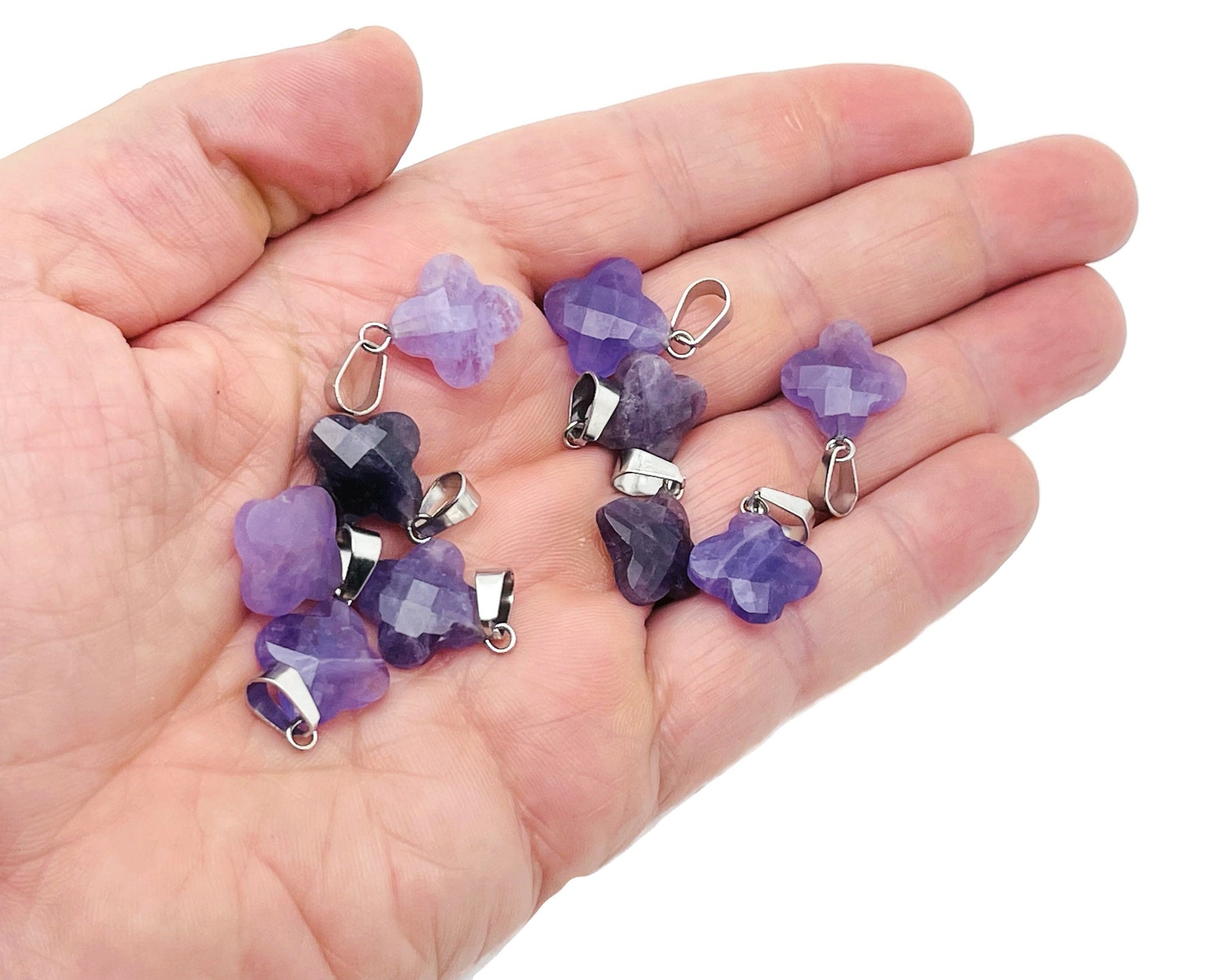 Amethyst four-leaf clover crystal pendant for DIY jewelry making, featuring purple gemstone and silver-tone setting.