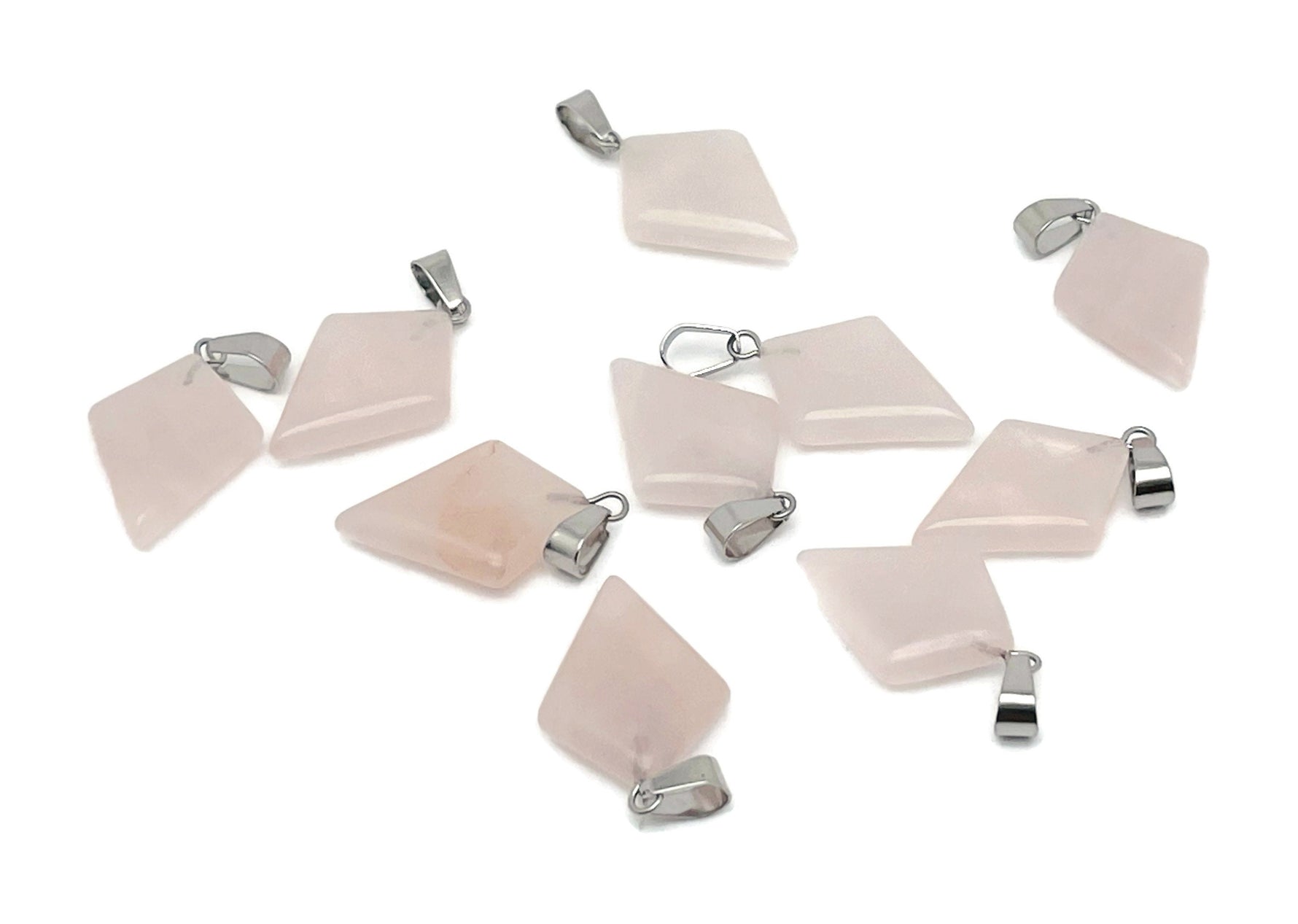 Rose quartz triangle gemstone pendant from GemstoneGO featuring a geometric design and polished rose quartz stone.