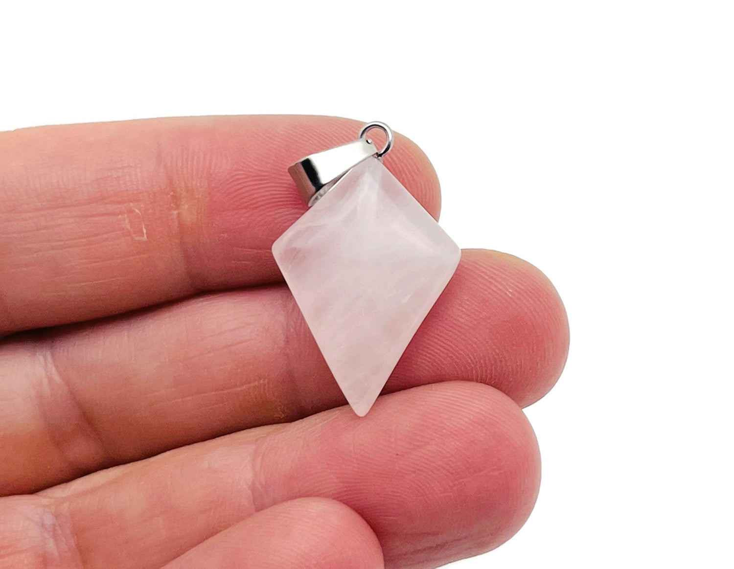Rose quartz triangle gemstone pendant with geometric design, displayed on a chain, from GemstoneGO.