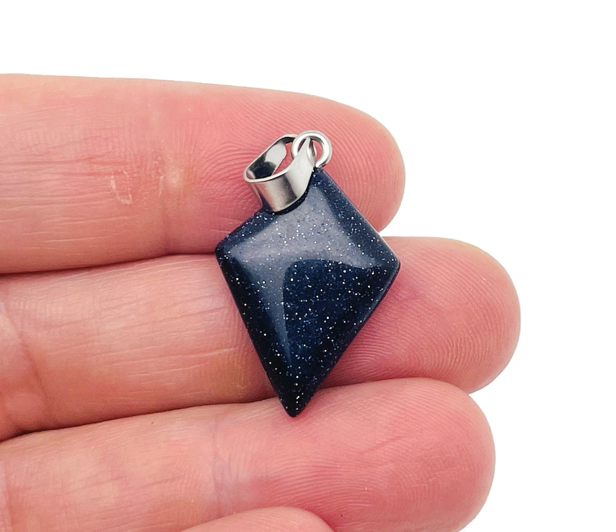 Blue Goldstone triangle gemstone pendant featuring a geometric design, crafted by GemstoneGO.