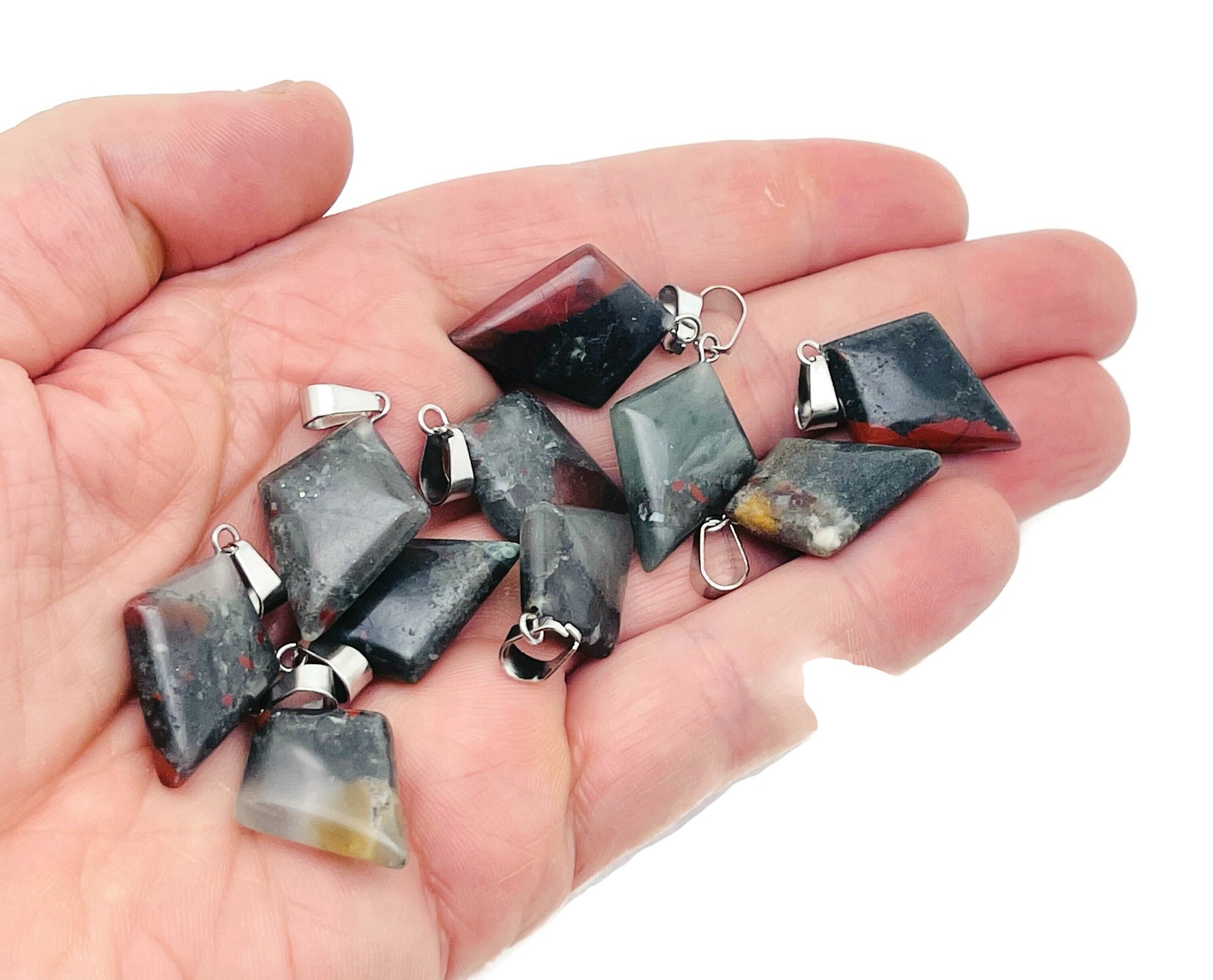 African Bloodstone triangle gemstone pendant featuring a geometric design, crafted by GemstoneGO.
