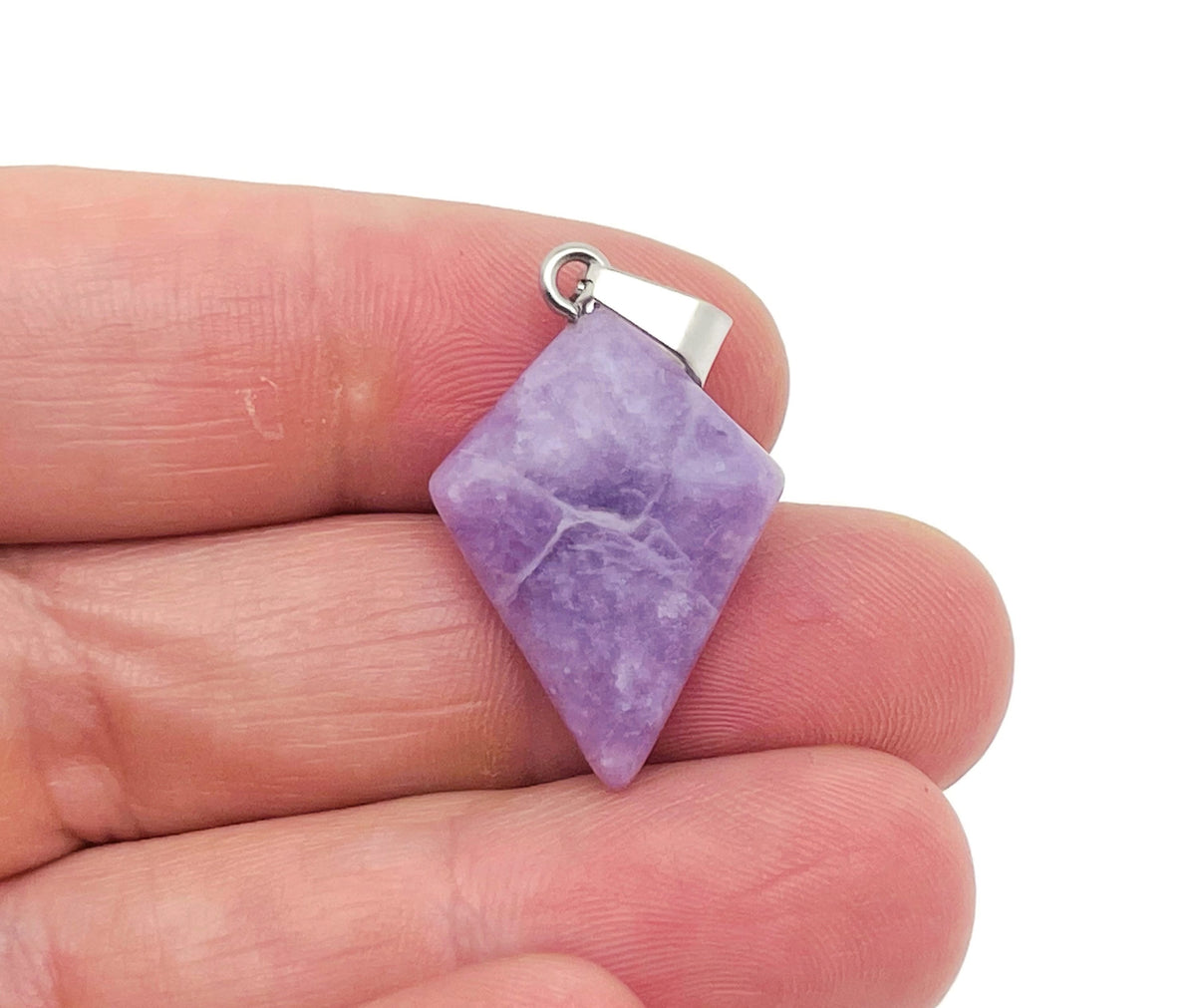 Lepidolite triangle gemstone pendant from GemstoneGO, featuring a geometric shape and natural purple mineral appearance.
