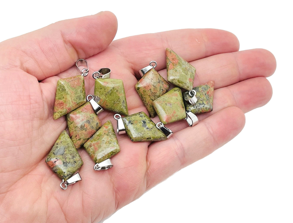 Unakite triangle gemstone pendant from GemstoneGO featuring a geometric design and vibrant green and pink hues.