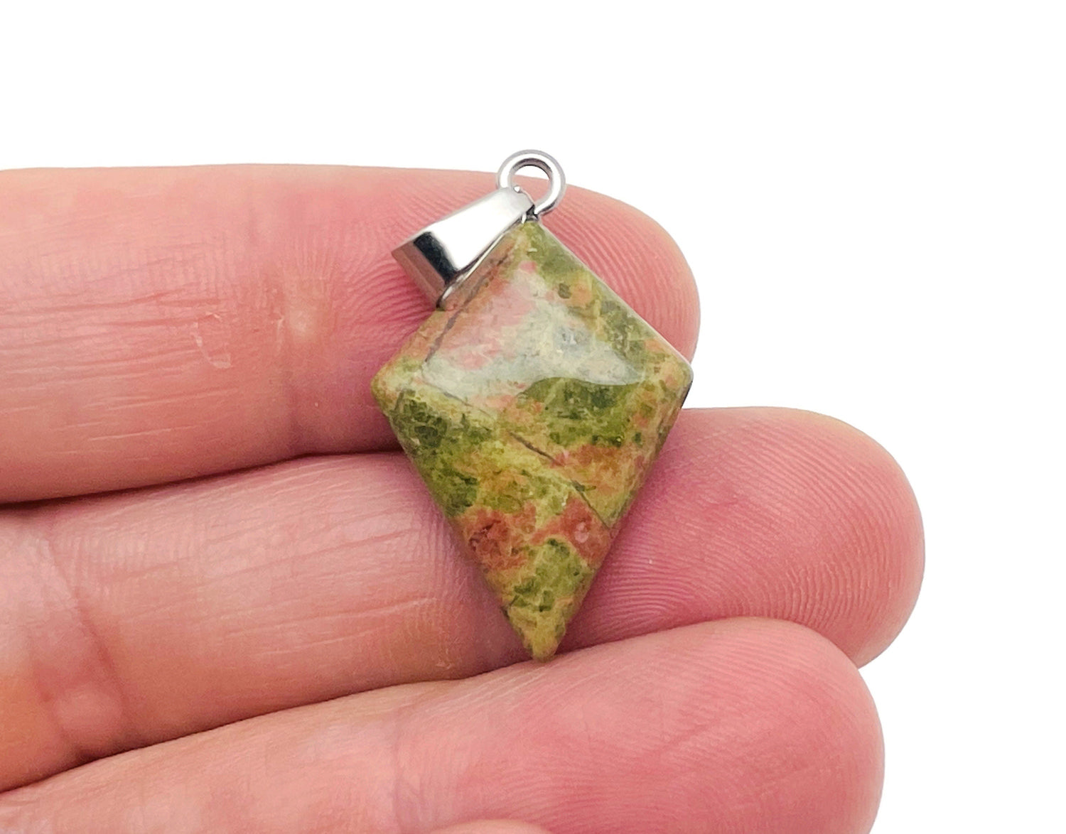 Unakite triangle gemstone pendant with geometric design, crafted by GemstoneGO, showcasing vibrant green and pink hues.