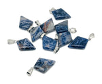 Sodalite triangle gemstone pendant from GemstoneGO featuring a geometric design, showcasing blue and white mineral patterns.