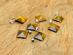 Tiger Eye pyramid gemstone pendant from GemstoneGO, showcasing a polished natural gemstone with a pyramid shape and rich golden-brown color.