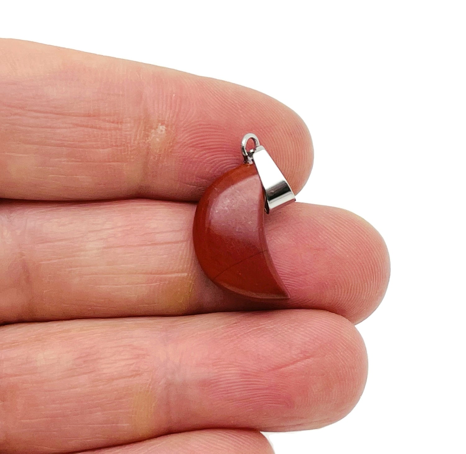Red Jasper moon pendant with matching earrings, featuring polished gemstone crystals for jewelry making and healing accessories.