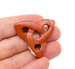 Red Jasper Celtic Knot carved gemstone pendant with Trinity Crystal design, showcasing intricate Celtic knot detailing by GemstoneGO.