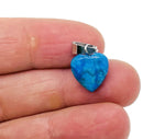 Blue Apatite heart pendant by GemstoneGO featuring a mini crystal design, showcasing a polished blue gemstone on a delicate chain