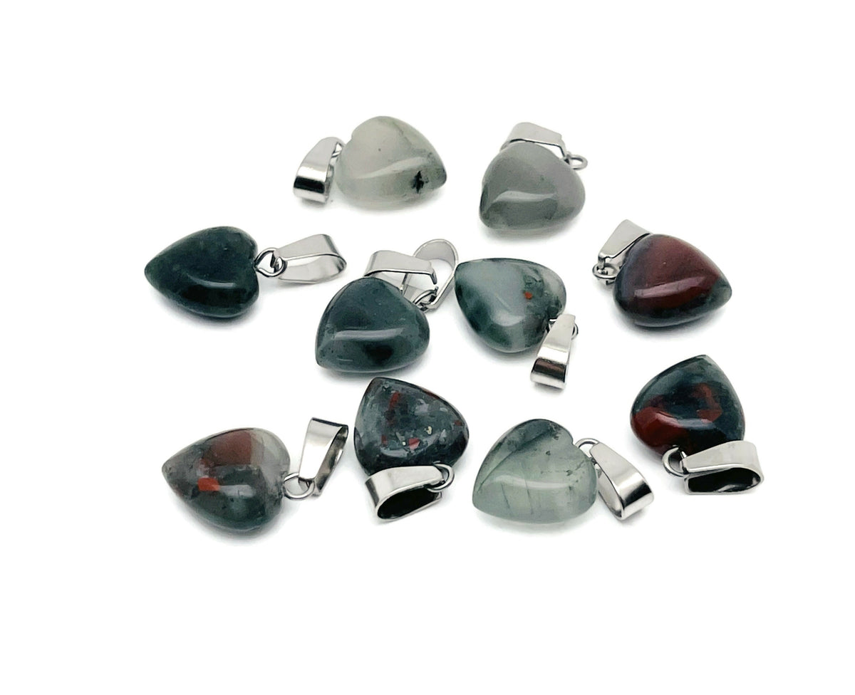 African Bloodstone heart-shaped pendant from GemstoneGO featuring a mini crystal design on a silver chain.