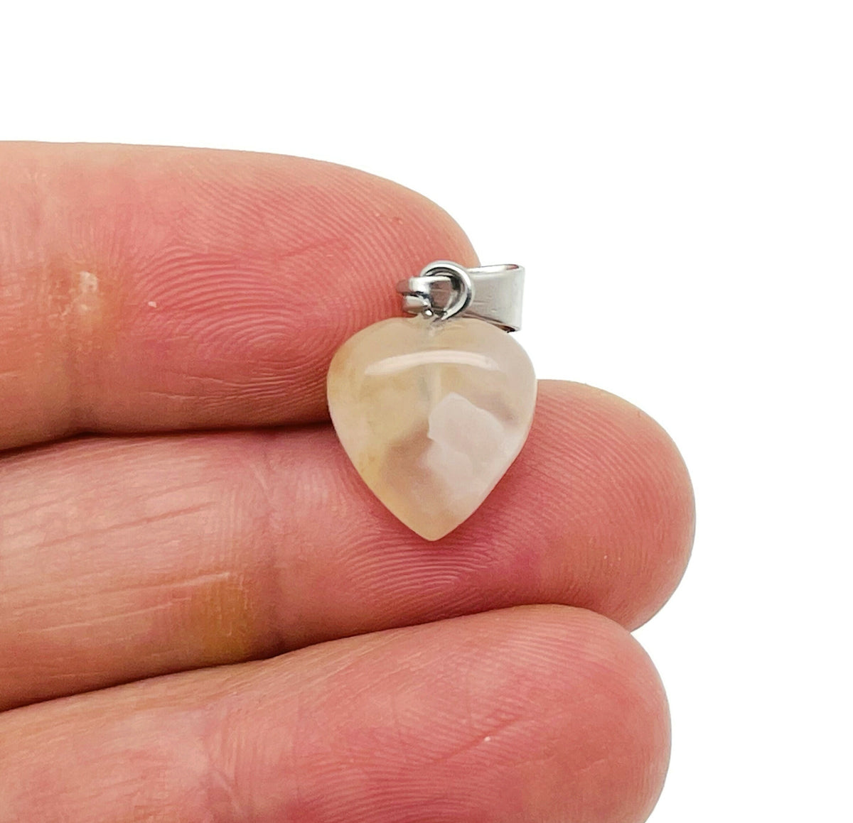Flower Agate Heart Pendant with cherry blossom design, mini crystal pendant by GemstoneGO showing intricate details and vibrant colors.