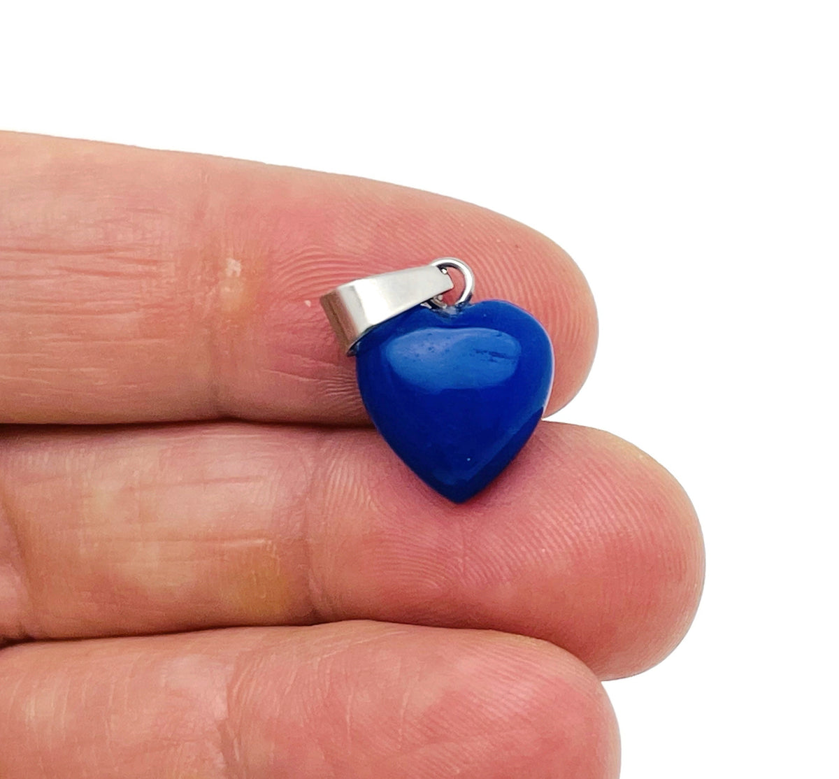 Blue jade heart pendant with mini crystal accent from GemstoneGO, showcasing a polished gemstone jewelry piece.