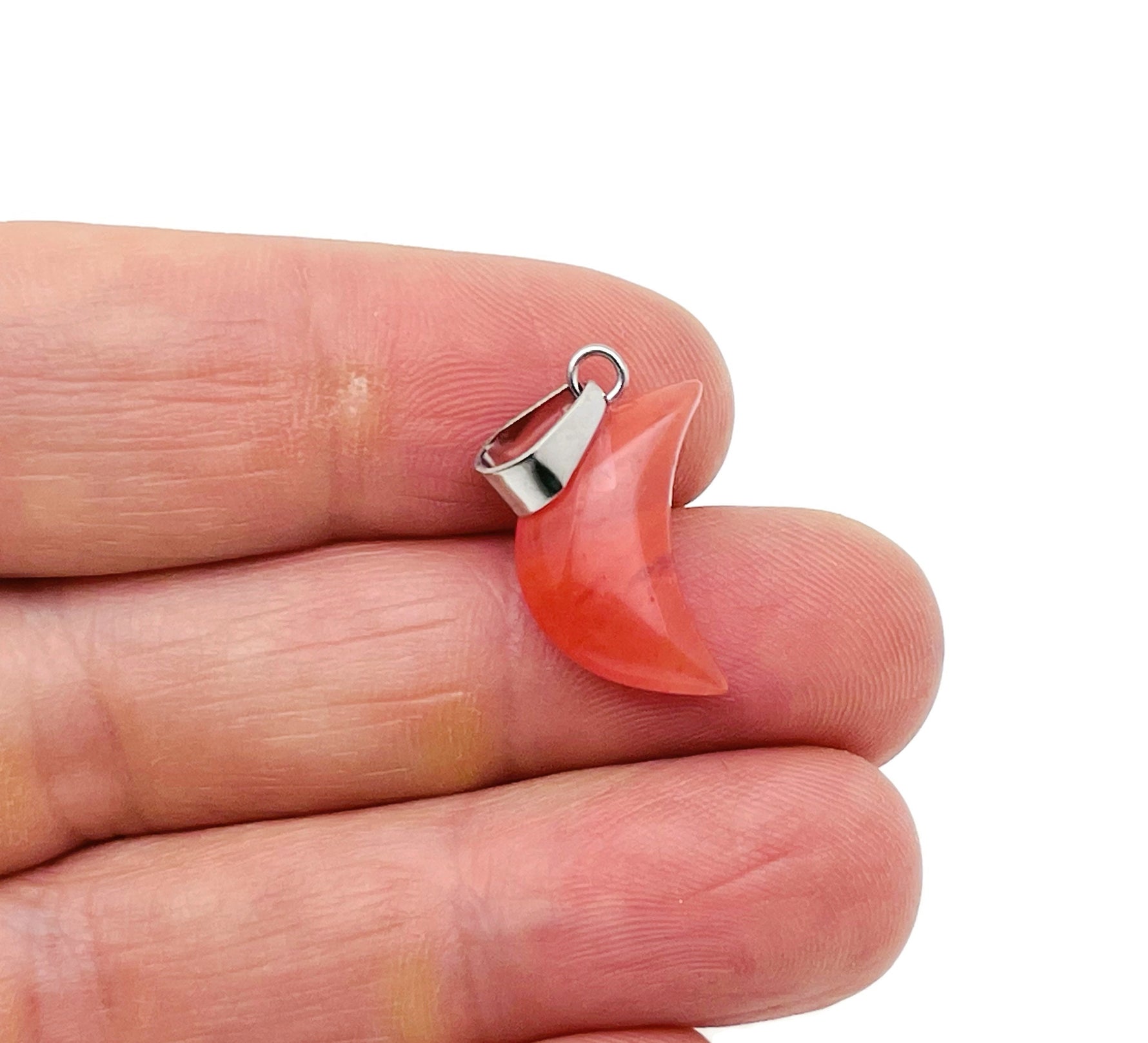 Cherry Quartz moon crystal pendant by GemstoneGO, featuring a polished cherry quartz stone shaped like a moon for jewelry making.
