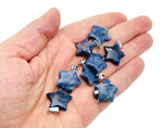 Sodalite star-shaped crystal pendant from GemstoneGO, ideal for jewelry making, featuring deep blue and white stone details.