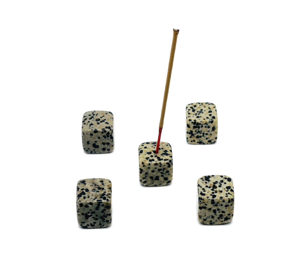 Dalmatian Jasper crystal incense holder with carved design, showcasing a smooth, polished stone for burning incense sticks.