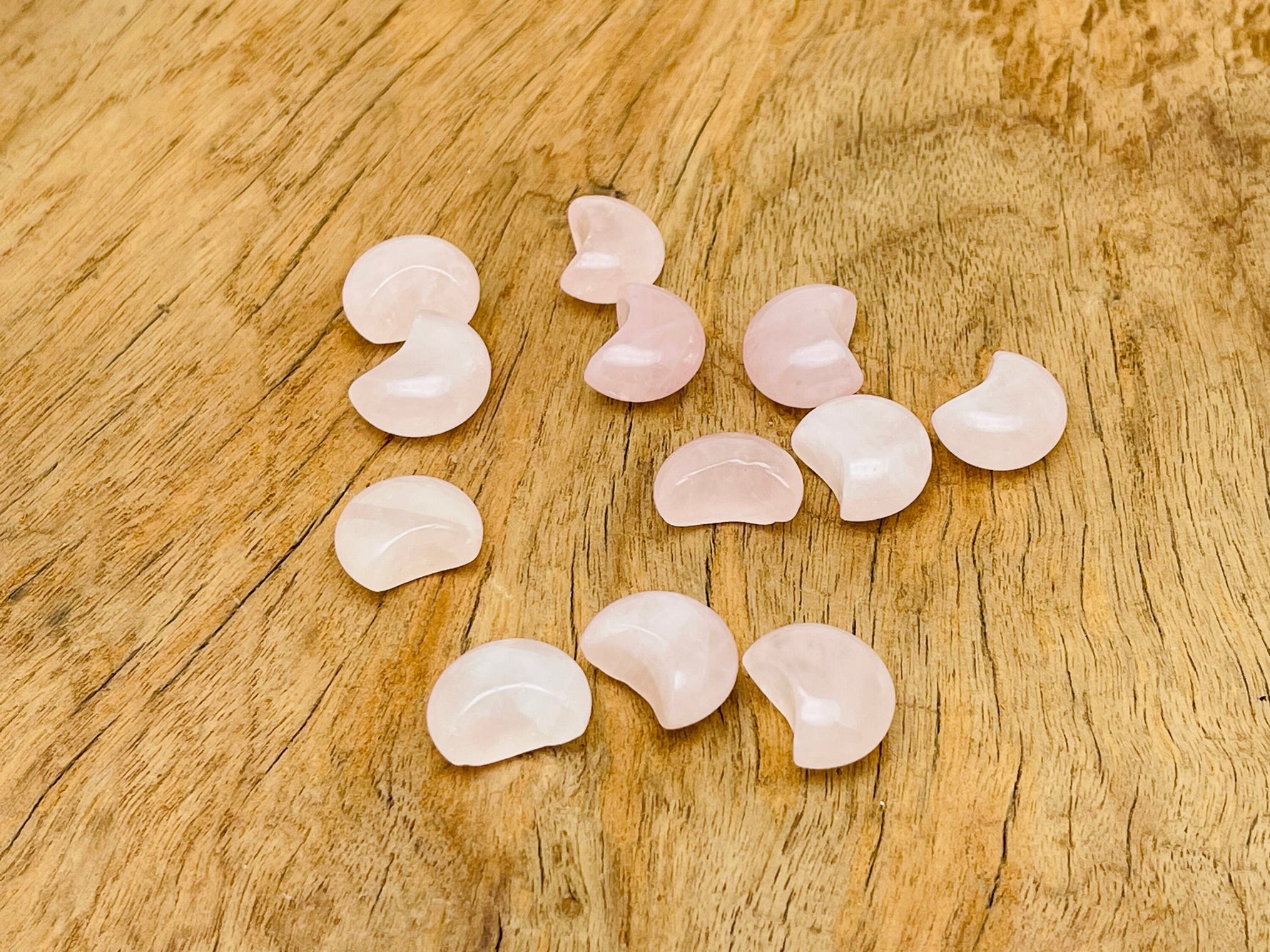 Rose quartz gemstone moon-shaped puffy pendant, 15x9mm, by GemstoneGO, featuring a soft pink, smooth, rounded gemstone design.