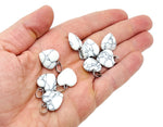 Mini Howlite heart pendant from GemstoneGO featuring a polished white gemstone crystal on a delicate chain.