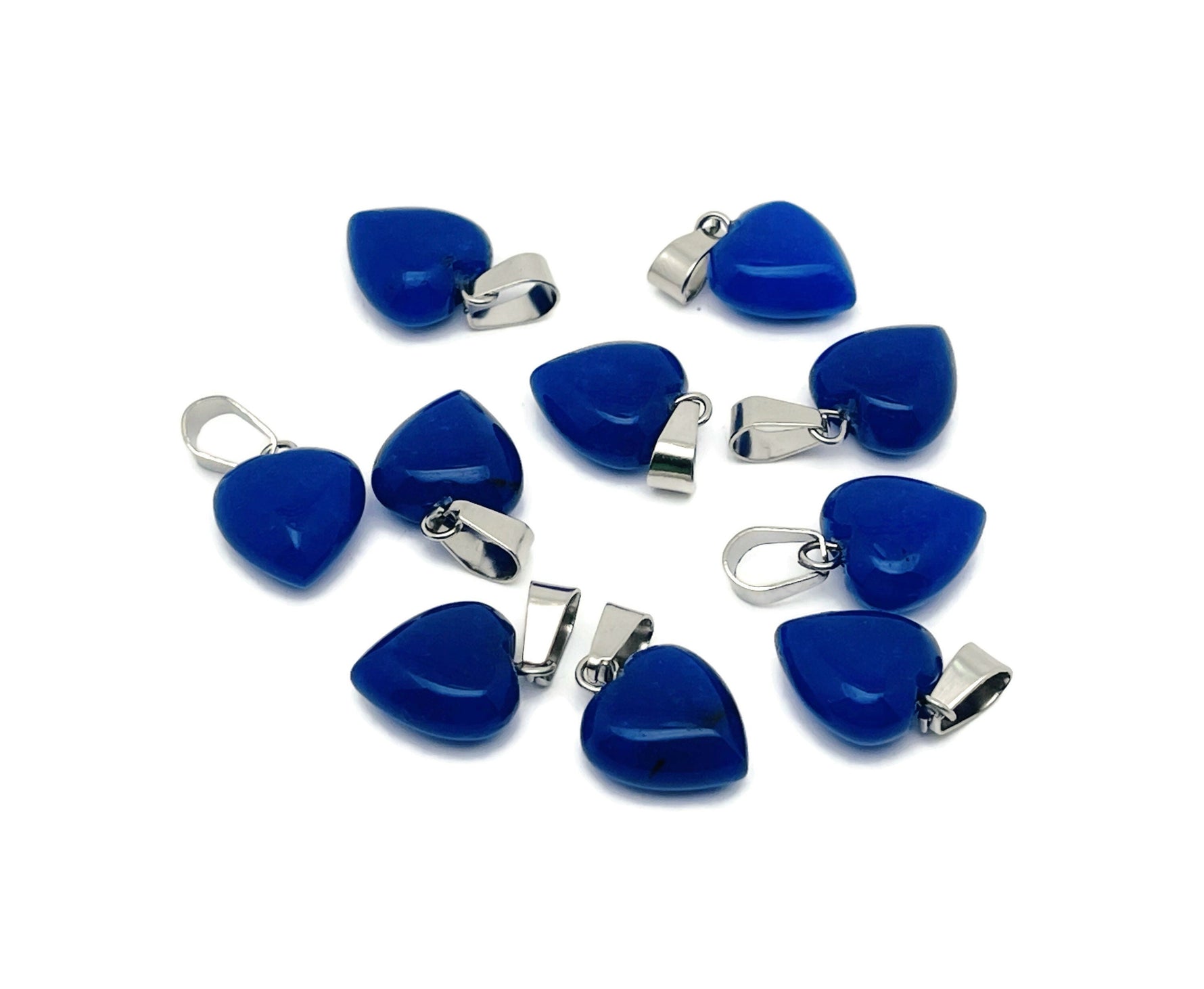 Blue jade heart pendant with mini crystal accents, showcasing the GemstoneGO jewelry design in a close-up view.