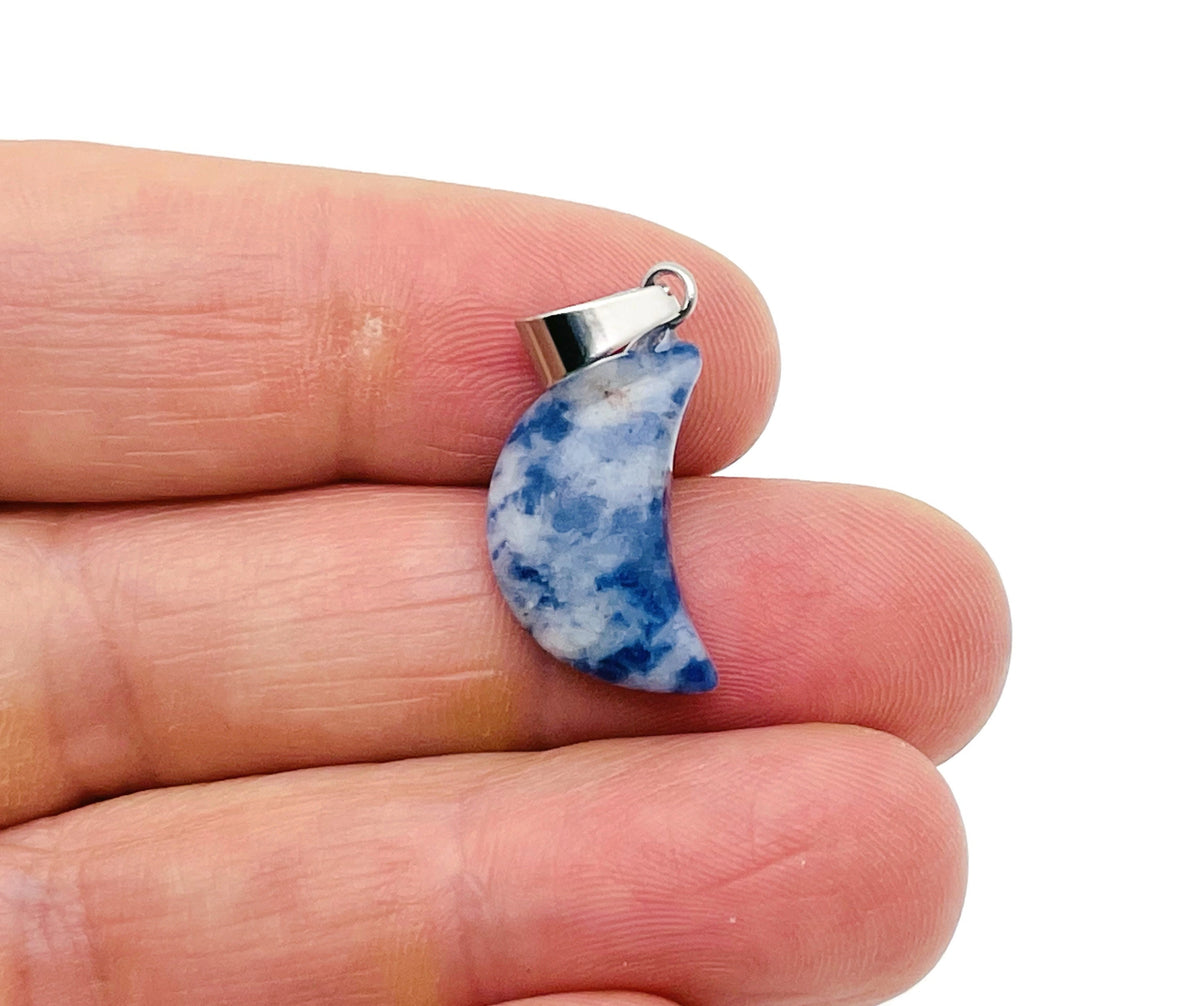 Sodalite moon crystal pendant from GemstoneGO with polished blue and white gemstone, ideal for jewelry making supplies.