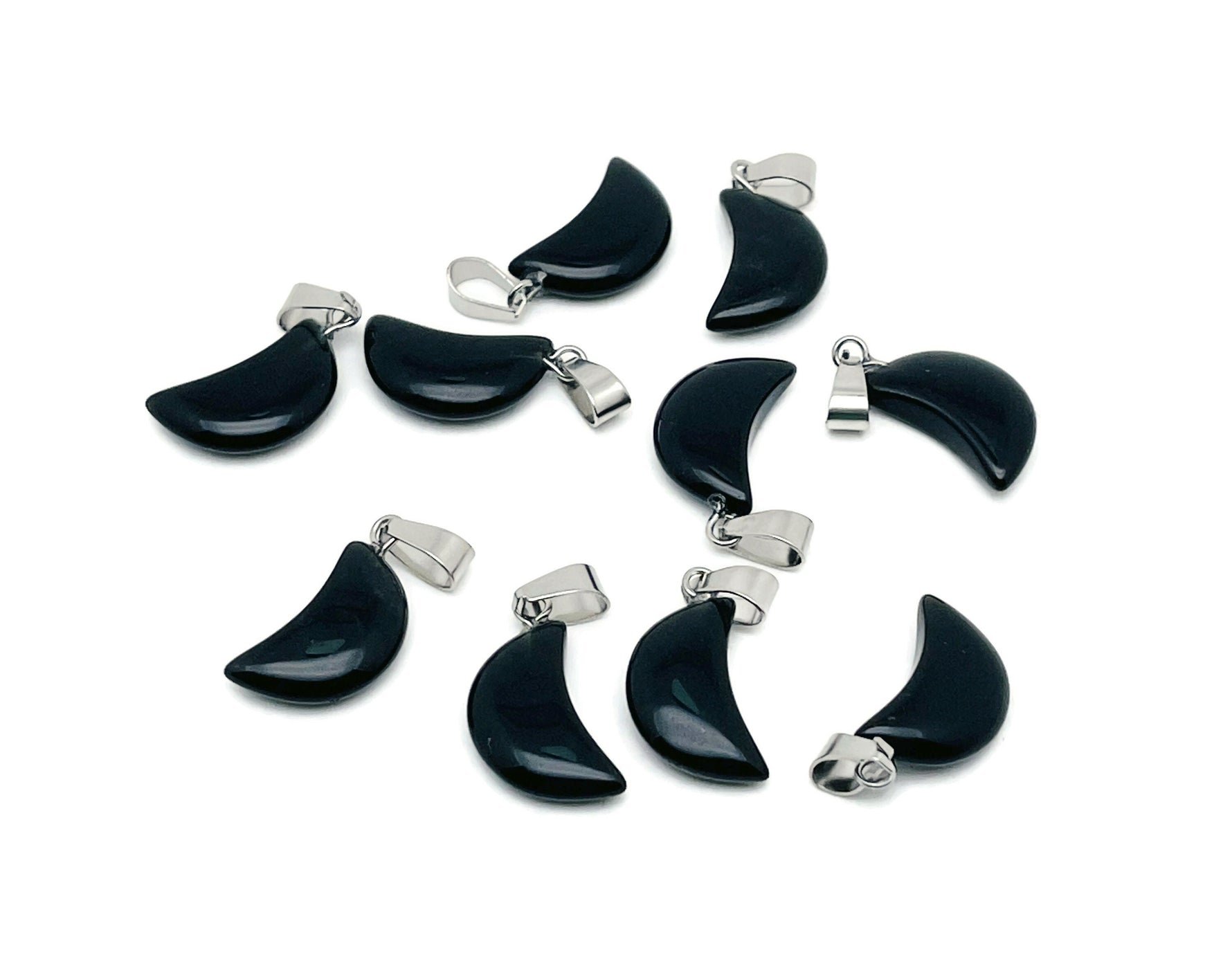 Obsidian moon crystal pendant from GemstoneGO, showcasing a polished black gemstone with moon-shaped design, perfect for jewelry making.
