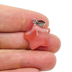 Cherry quartz star pendant from GemstoneGO, a crystal jewelry making supply featuring a polished cherry quartz star-shaped pendant.