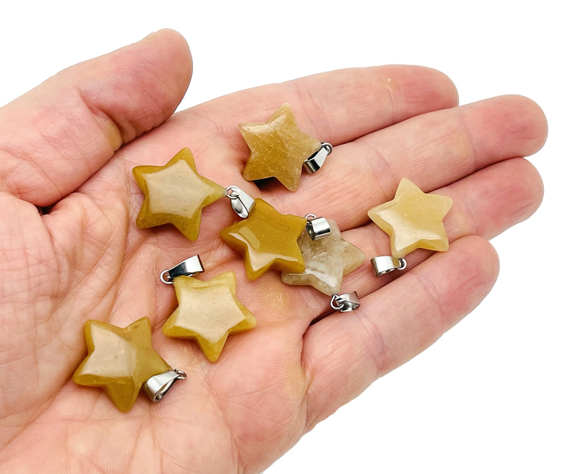 Yellow jade star pendant with crystal accents, ideal for jewelry making, from GemstoneGO's gemstone jewelry supplies.
