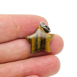 Tiger Eye star pendant with crystal accents, gemstone jewelry making supply from GemstoneGO, showcasing detailed craftsmanship.